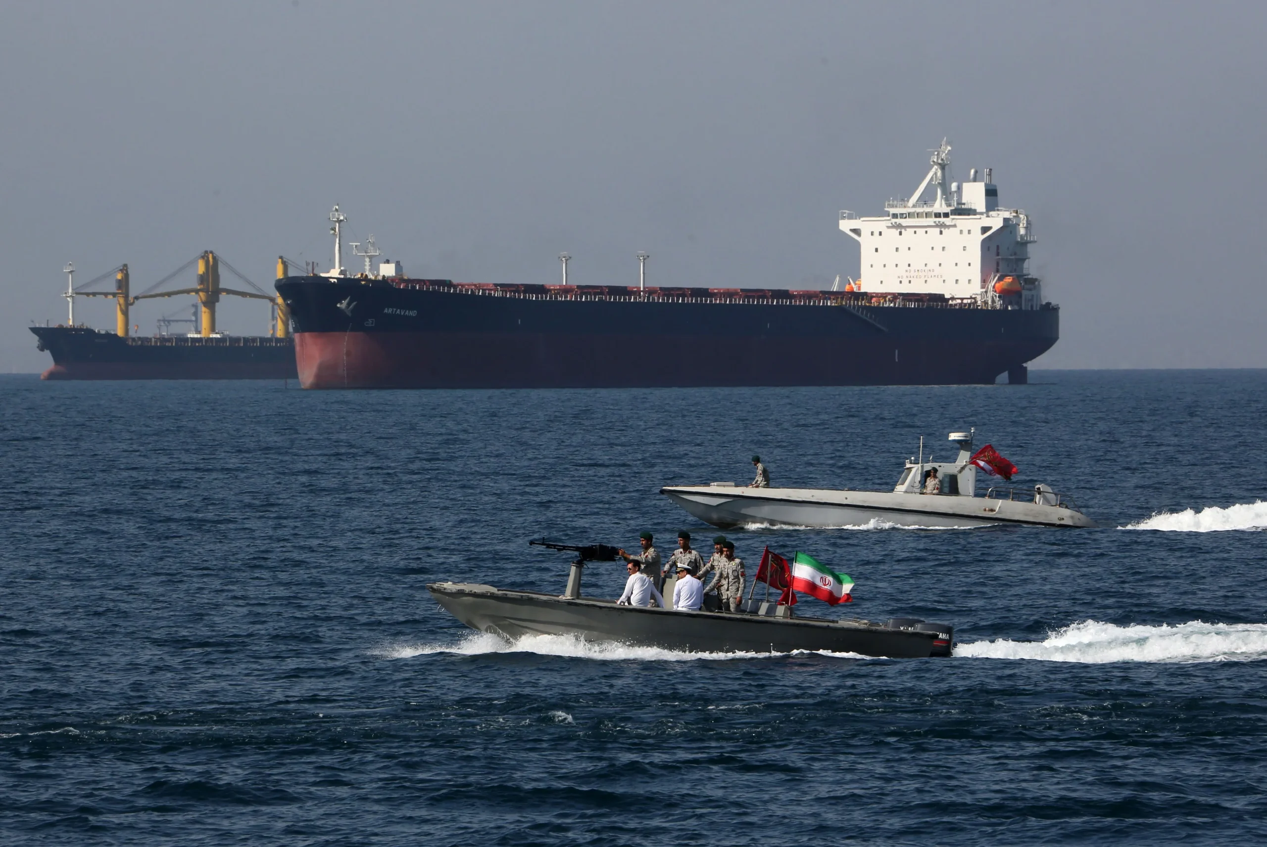 An oil tanker navigating the Strait of Hormuz, through which roughly 20% of global oil supply passes daily