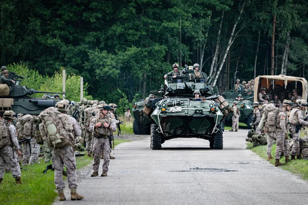 NATO soldiers and armored vehicles during a large-scale military exercise in Europe, 2025 — the continent's largest military buildup since the Cold War