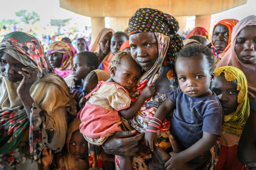 Sudanese civilians displaced by the civil war between the SAF and RSF sheltering in a makeshift camp, 2025