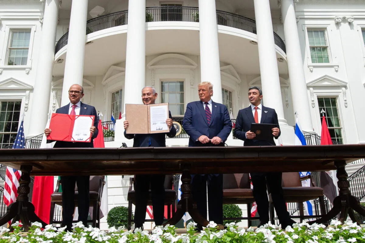 US President Donald Trump's Truth Social post on May 25, 2026 declaring it mandatory that Pakistan, Qatar, Turkey, Egypt, Jordan and Saudi Arabia simultaneously join the Abraham Accords — while acknowledging that one or two refusals would be accepted
